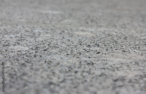 Grey granite stone texture background of seanless mineral stone with selective focus 