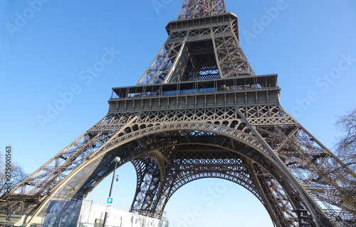 PARIS-FRANCE-FEB 25, 2019: The Eiffel Tower is a wrought-iron lattice tower on the Champ de Mars in Paris, France. It is named after the engineer Gustave Eiffel.