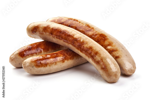 Grilled German pork sausages, Thuringer Rostbratwurst, close-up, isolated on white background