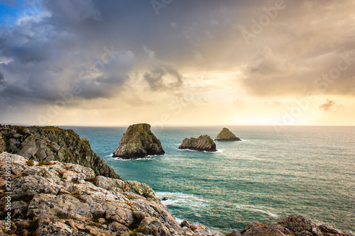 The rocks on Beg Pen Hir at sunset in the crozon peninsula, Finistere department, Camaret-sur-Mer. Brittany (Bretagne), France.