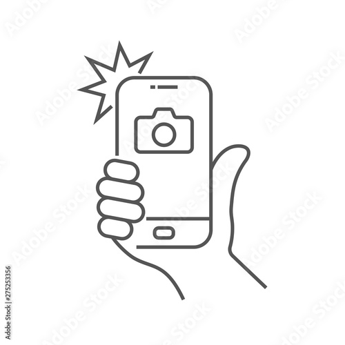 Photo on smartphone with flash, hand is holding smartphone and doing photo. Camera viewfinder, hand and flash. Editable Stroke. EPS 10.