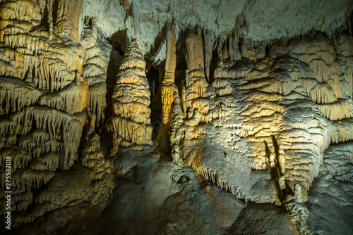 Stalactites and stalagmites underground in cave system in Postojna