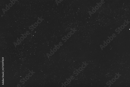 Dust and scratches design. Black abstract background. Tiny white lights. Copy space.