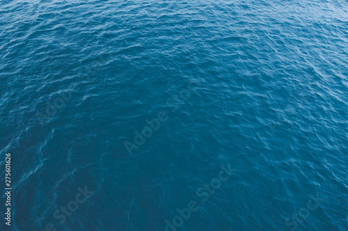 Beach top view with pattern wave. Stock photo image of blue color deep ocean water, sea surface. Soft blue ocean wave, turquoise waves, clear water surface. Nature surface background texture design