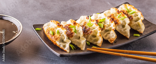 gyoza or dumplings snack with soy sauce