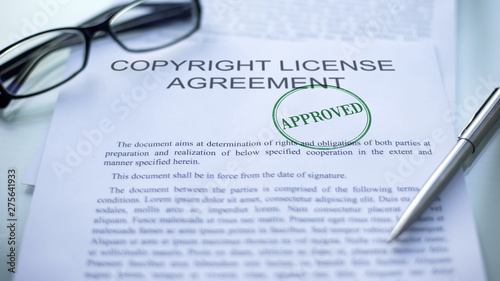 Copyright license agreement approved, seal stamped on official business document