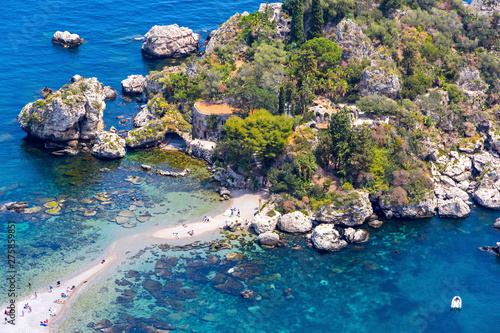 Aerial view of Isola Bella island and beach in Taormina, Sicily, Italy. Giardini-Naxos bay, Ionian sea coast. Isola Bella (Sicilian: Isula Bedda) also known as The Pearl of the Ionian Sea