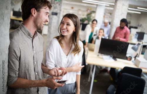 Group of business people collaborating on project in office