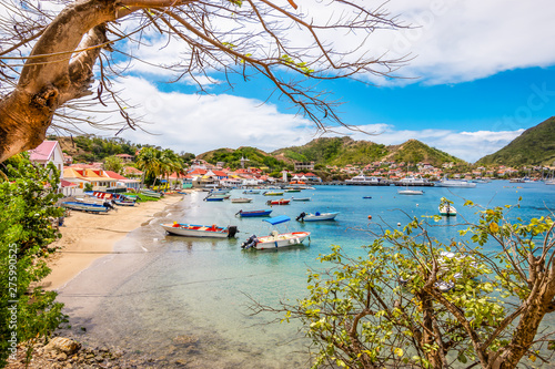 Landscape with small beach and bay with boats. Terre-de-Haut, Les Saintes, Iles des Saintes, Guadeloupe, French Antilles, Caribbean. 