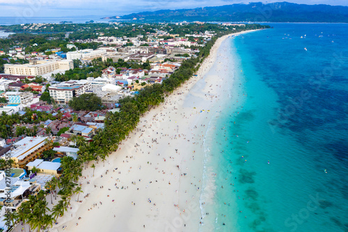 Aerial view of a crowded beach as people gather to watch sunset (Boracay Island, Philippines)