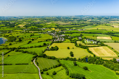 Aerial drone view of green fields and farmland in rural Wales