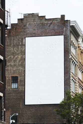 Big billboard template on building in city