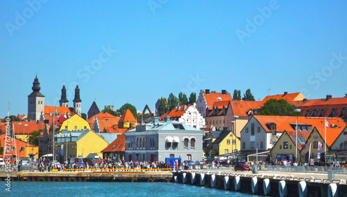 View from Port onto old town of Visby, Gotland with cathedral and historic buildings and masses of tourist