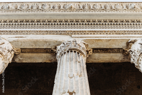 Detail of entablature and columns from The Temple of Hadrian, in Rome, Italy.