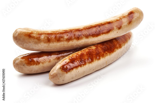 Grilled German pork sausages, Thuringer Rostbratwurst, close-up, isolated on white background