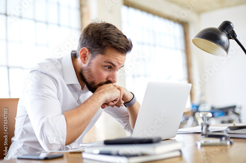 Young man worry about stock market