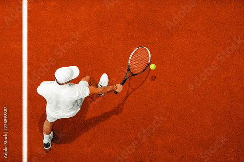 Man playing tennis