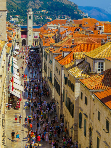 DUBROVNIK, CROATIA - AUGUST 8, 2015: Aerial view of the Stradun (or Placa), the pedestrian main street crowded by tourists and locals.