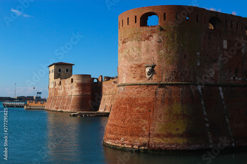 View to Old Fortress of Livorno (Fortezza Vecchia), standing on the Ligurian sea under bright blue sky