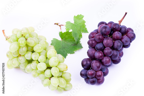 green and wine grapes on white background