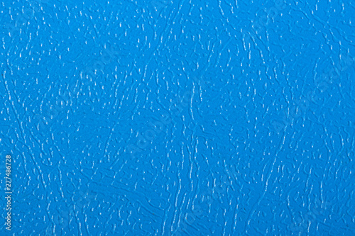 Blue textured leather background. Abstract leather texture.