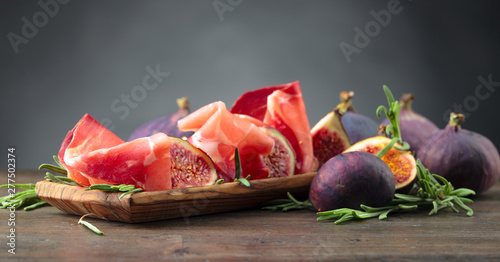 Prosciutto with figs and rosemary.