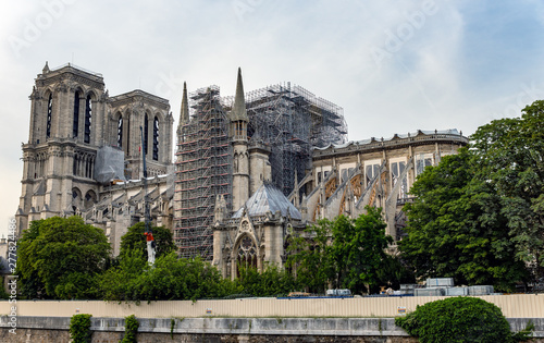 Paris, France - July 10, 2019: Notre Dame de Paris. Reinforcement work in progress after the fire. Wood Shoring now prevent the flying buttresses from collapsing.s after the fire