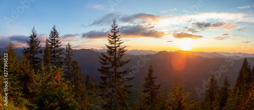 Beautiful Panoramic View of American Mountain Landscape during a vibrant and colorful summer sunset. Taken from Sun Top Lookout, in Mt Rainier National Park, South of Seattle, Washington, USA.