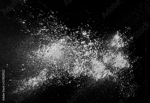 White powder isolated on black background, top view with clipping path