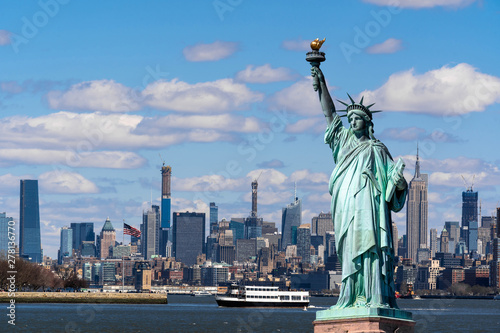 The Statue of Liberty over the Scene of New york cityscape river side which location is lower manhattan,Architecture and building with tourist concept