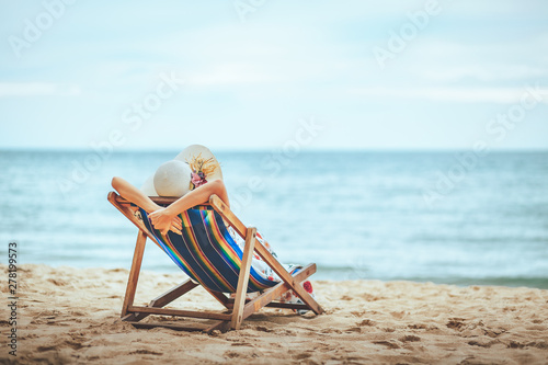 Woman on beach in summer