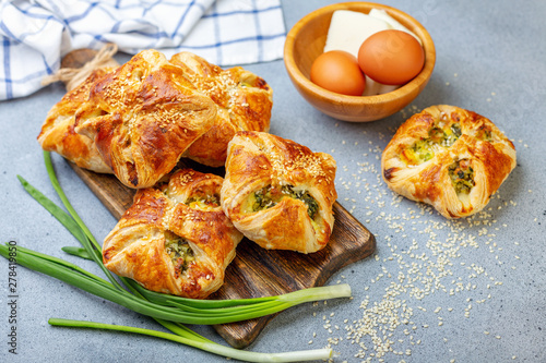 Puffs with spinach, egg and green onions.