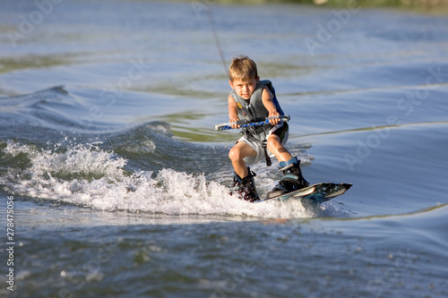 Young Boy Wakeboarding