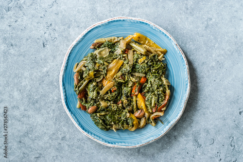 Homemade Healthy Chard Food with Olive Oil, Almonds and Julienne Vegetables Turkish Food Pazi. Traditional Organic Dish.