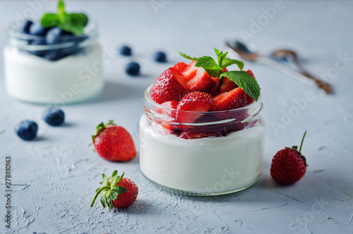 Greek yogurt strawberry and blueberry parfaits with fresh berries