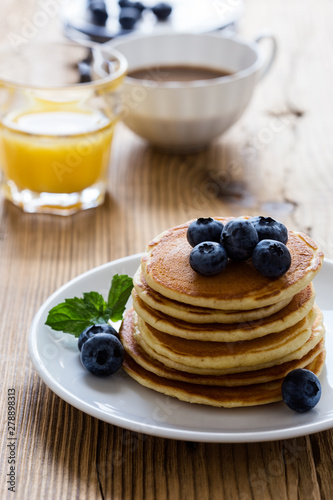 Morning meal, homemade pancakes, fresh summer berries