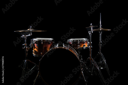 Drum Set On A Stage At Dark Background. Musical Drums Kit On Stage.