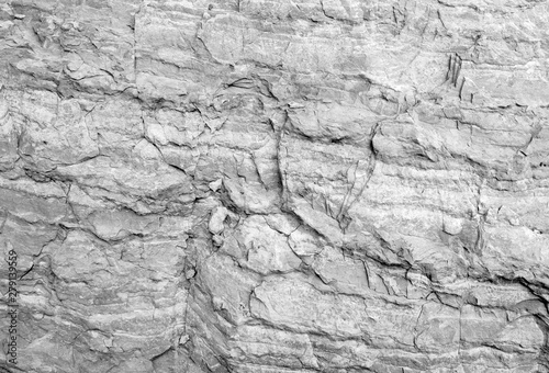 Rough white stone wall, natural rock texture