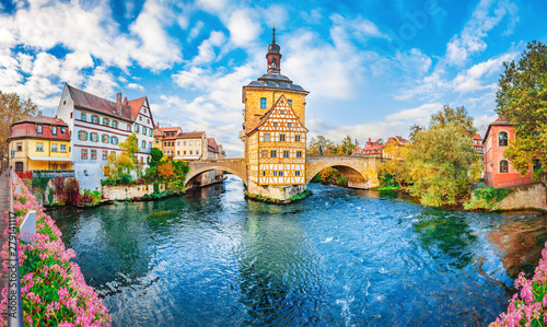 Old town Bamberg in Bavaria, Germany. Romantic historical town on Romantic road in Bavaria, located on crossing of Regnitz and Main rivers. Autumn view of old Timber Framing architecture and flowers