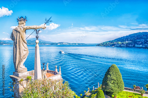 Beautiful Isola Bella island with flower garden and sculptures on Lake Lago Maggiore, Stresa, Italy