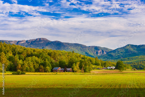 Farm landscape with Mt. Mansfield in the background, Stowe, Vermont, USA