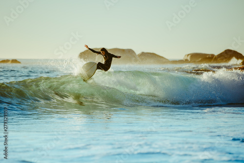 Young man water surfing in the sea