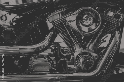 art photography in black and white vintage tone of chopper motorcycle engine., dim vintage tone