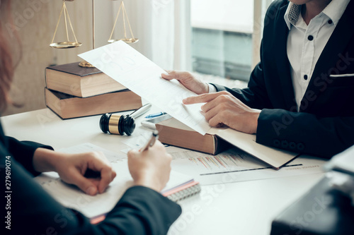 Businessman and lawyer discuss the contract document. Treaty of the law. Sign a contract business.