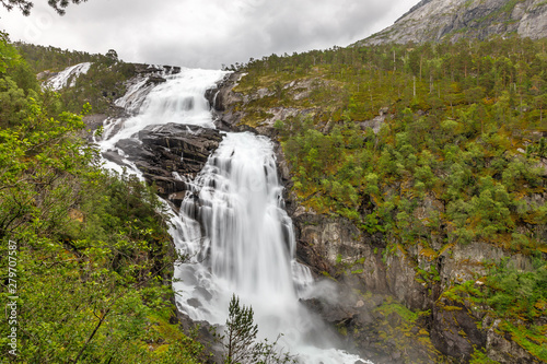 Nyastolfossen waterfall powerful streams in Husedalen valley, Kinsarvik, municipality Ullensvang, Hordaland county, Norway