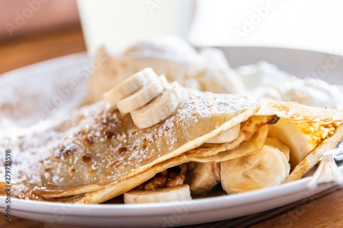 Walnuts and sliced bananas crepe