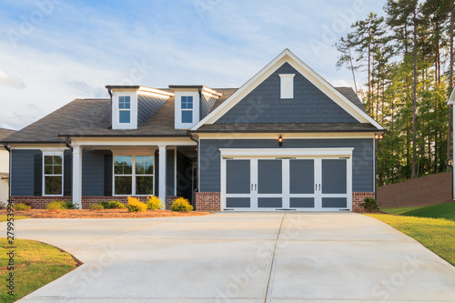 A gray ranch style model house