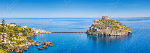 Aerial panoramic view of Aragonese Castle located in sea near Ischia island, Italy.