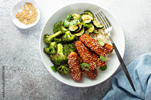 Teryaki tempeh with rice and roasted vegetables