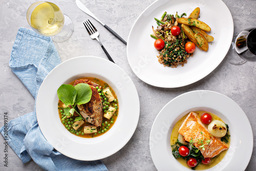 Spring lunch trio of salmon, chicken and vegetarian dish